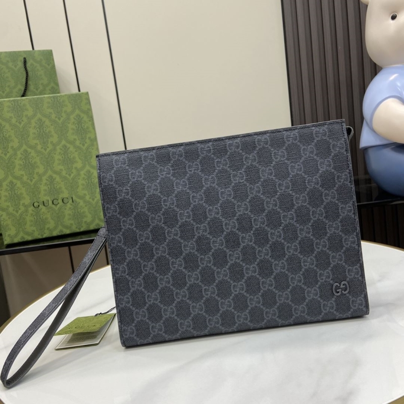 G*u*i clutch bags
